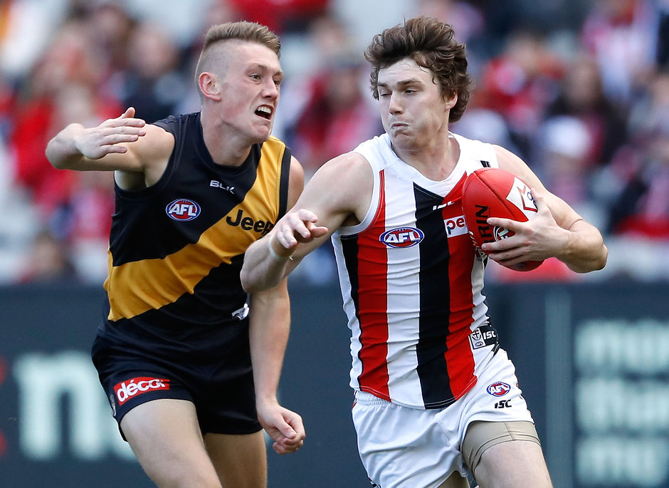 AFL 2016 Rd 22 - Richmond v St Kilda MELBOURNE, AUSTRALIA - AUGUST 20: Blake Acres of the Saints is tackled by Debutante, Callum Moore of the Tigers during the 2016 AFL Round 22 match between the Richmond Tigers and the St Kilda Saints at the Melbourne Cricket Ground on August 20, 2016 in Melbourne, Australia. (Photo by Adam Trafford/AFL Media)